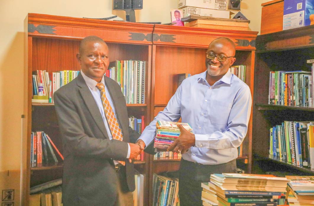 A Milestone for St. Paul’s: Dr. Evans Kituyi Donates Essential Academic Texts