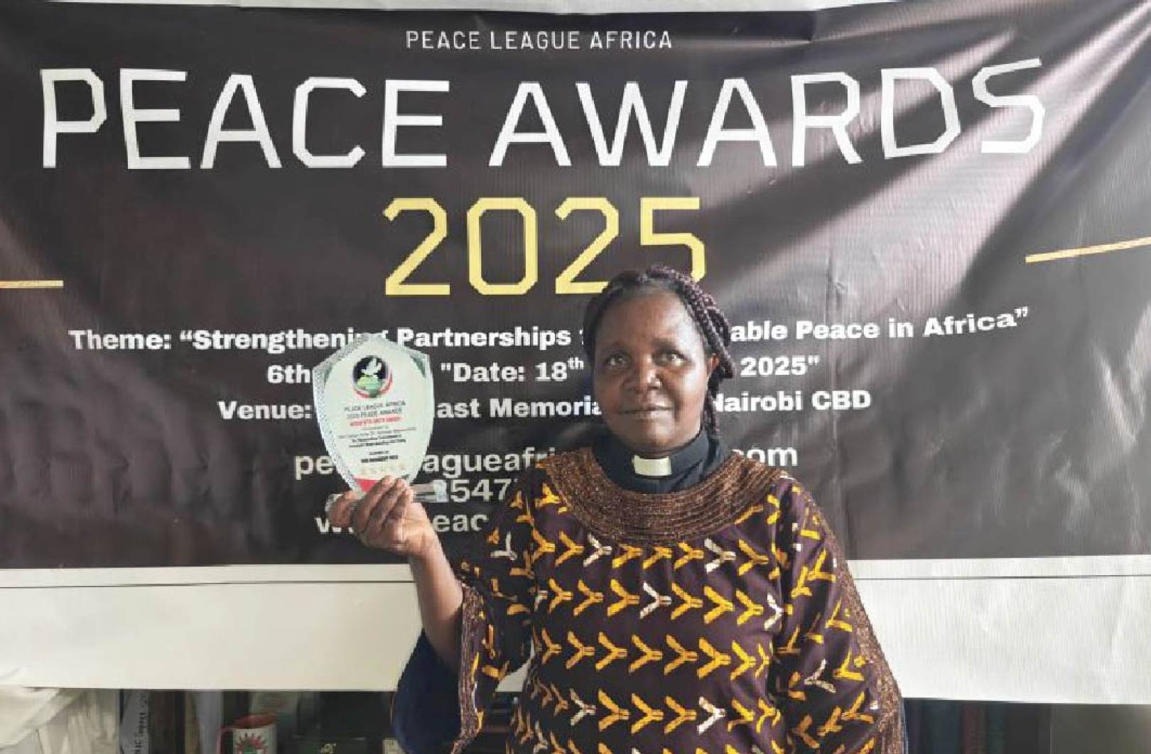 Celebrating Excellence: Amb. Ven. Dr. Scholar Wayua Honored by Peace League Africa
