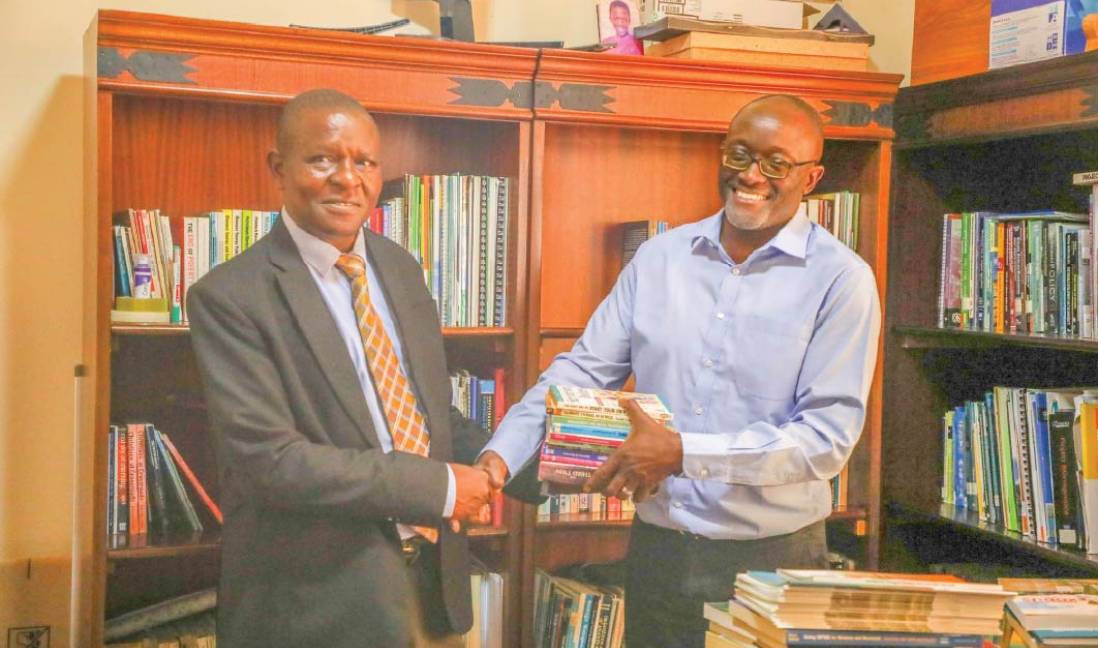 A Milestone for St. Paul’s: Dr. Evans Kituyi Donates Essential Academic Texts